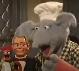 Pepe and Seymour in their diner outfits sing to ventriloquist dummy Gary Cahuenga